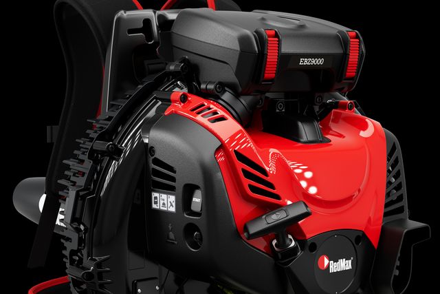 Rear view of a RedMax backpack leaf blower with ergonomic design.