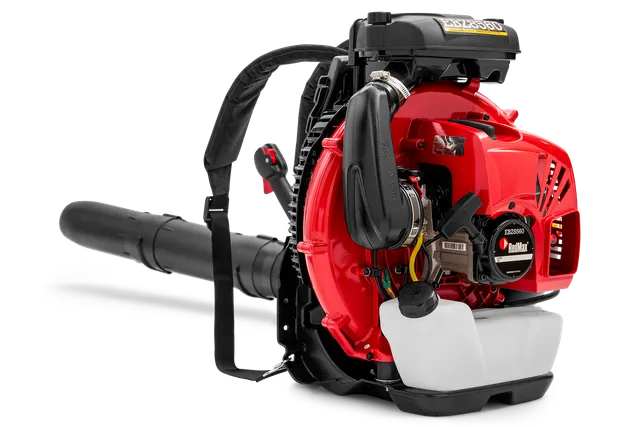 Side view of a leaf blower with visible engine components and shoulder strap.