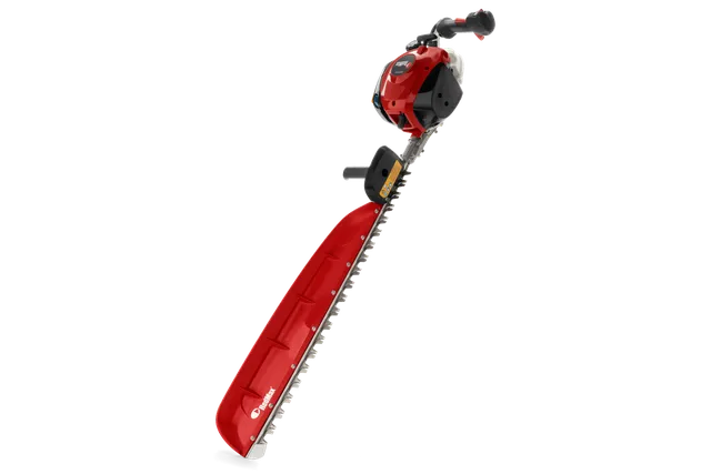 Side view of a hedge trimmer with a long cutting blade.