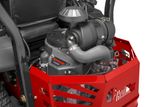 Close-up view of a Kawasaki engine mounted on a Haulmark equipment.