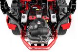 Top view of a commercial mower engine and components.